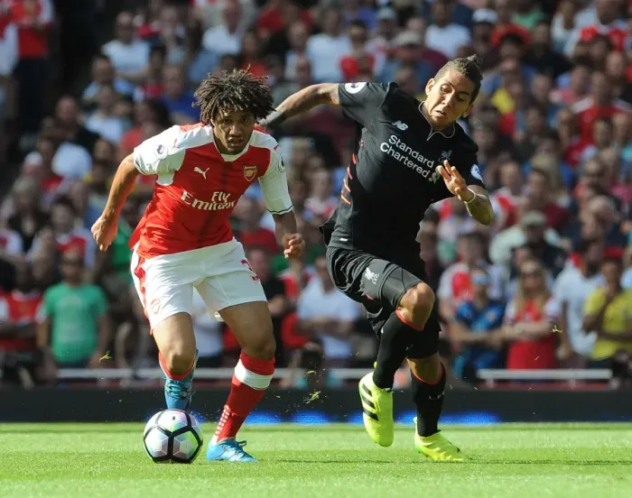 Framed Print : Arsenal vs. Liverpool Showdown: Elneny vs. Firmino, 2016-17 Premier League Clash at Emirates Stadium
