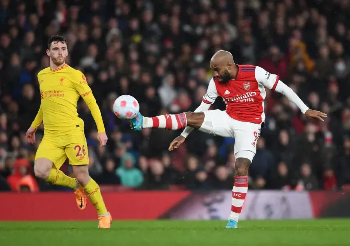 Framed Print : Arsenal vs. Liverpool Showdown: Lacazette vs. Robertson - Premier League Battle Framed Print : Arsenal vs. Liverpool Showdown: Lacazette vs. Robertson - Premier League Battle
