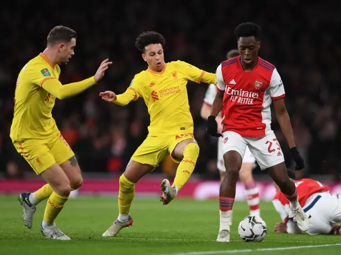 Framed Print : Arsenal vs Liverpool Showdown: Lokonga vs Gordon Battle - Carabao Cup Semi-Final Clash: A Fight for Football Supremacy Framed Print : Arsenal vs Liverpool Showdown: Lokonga vs Gordon Battle - Carabao Cup Semi-Final Clash: A Fight for Football Supremacy