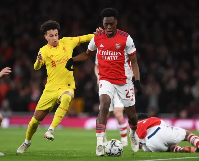 Framed Print : Arsenal vs Liverpool Showdown: Lokonga vs Gordon Battle for Carabao Cup Semi-Final Victory