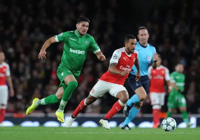 Framed Print : Arsenal vs Ludogorets: Theo Walcott Clashes with Jose Luis Palomino in the 2016-17 UEFA Champions League