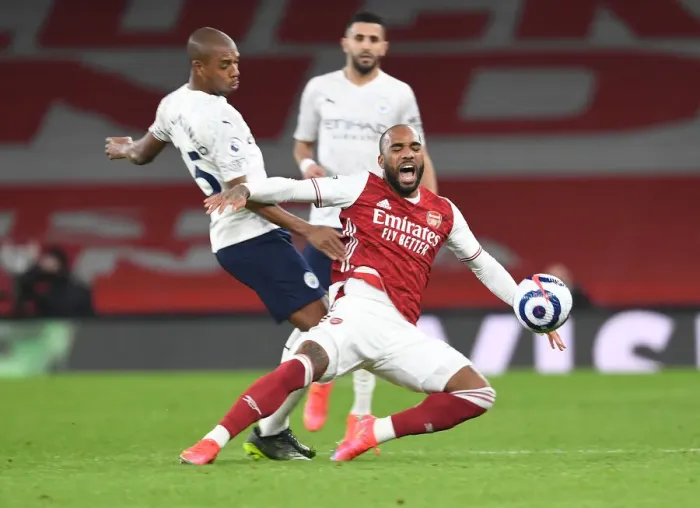 Framed Print : Arsenal vs Manchester City: Lacazette vs Fernandinho - Premier League Clash Amidst Empty Stands (February 2021) Framed Print : Arsenal vs Manchester City: Lacazette vs Fernandinho - Premier League Clash Amidst Empty Stands (February 2021)