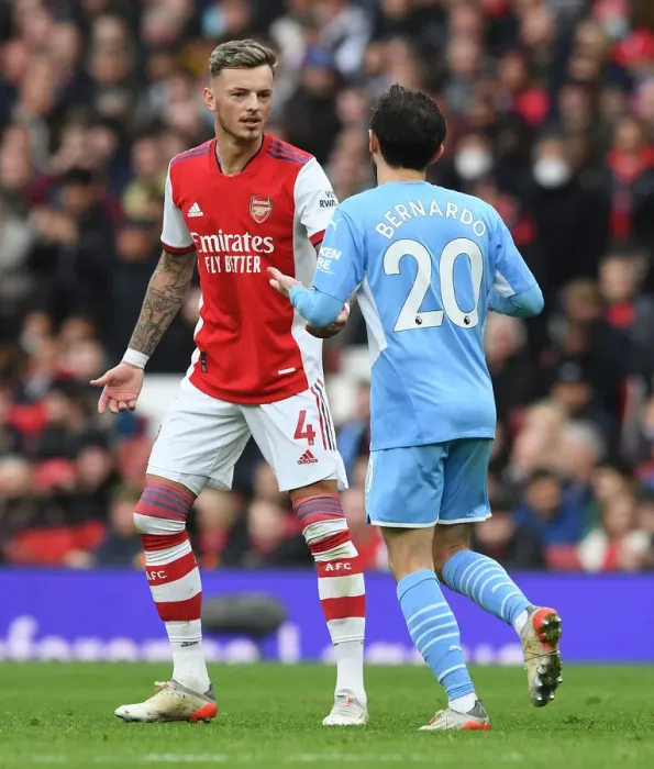 Framed Print : Arsenal vs Manchester City: Ben White and Bernardo Silva in Deep Conversation during the 2021-22 Premier League Clash at Emirates Stadium Framed Print : Arsenal vs Manchester City: Ben White and Bernardo Silva in Deep Conversation during the 2021-22 Premier League Clash at Emirates Stadium