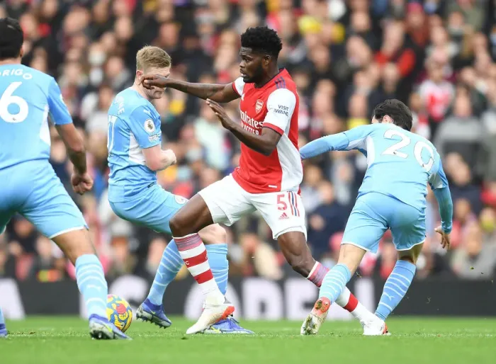 Framed Print : Arsenal vs Manchester City: Thomas Partey Clashes with Kevin De Bruyne and Bernardo Silva in Intense Premier League Showdown