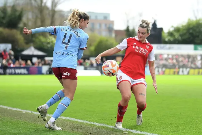 Framed Print : Arsenal vs. Manchester City: A Battle for Possession in the FA Women's Super League