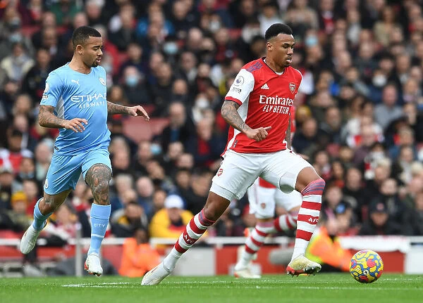 Arsenal vs Manchester City: Gabriel Magalhaes vs Gabriel Jesus - Intense Battle at Emirates Stadium (Premier League 2021-22)