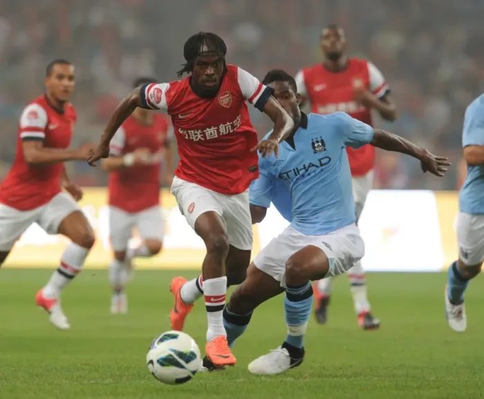 Framed Print : Arsenal vs Manchester City: Gervinho Breaks Past Razak in Beijing Pre-Season Clash, 2012 Framed Print : Arsenal vs Manchester City: Gervinho Breaks Past Razak in Beijing Pre-Season Clash, 2012