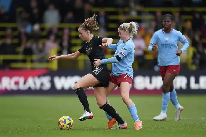 Framed Print : Arsenal vs Manchester City: Intense Battle in FA Women's Super League