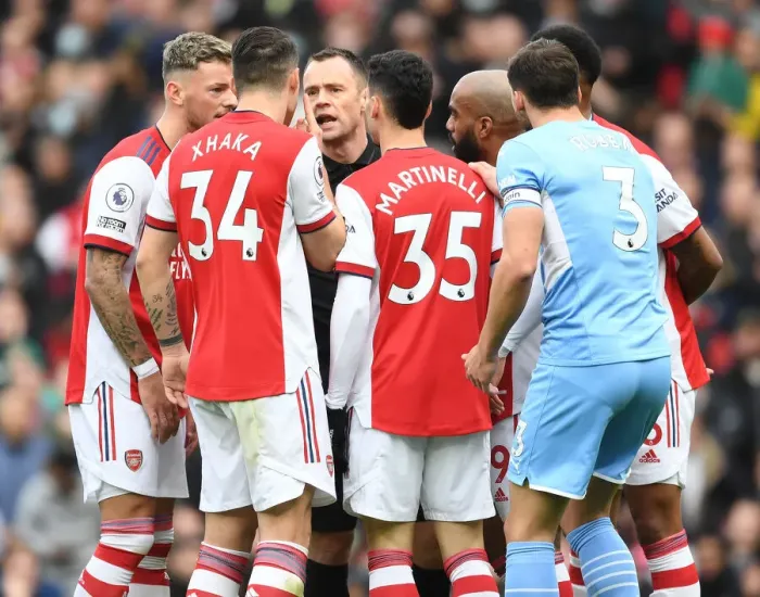 Framed Print : Arsenal vs Manchester City: Intense Moment as Players Argue with Referee Framed Print : Arsenal vs Manchester City: Intense Moment as Players Argue with Referee