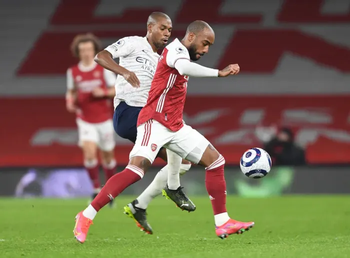 Framed Print : Arsenal vs Manchester City: Lacazette vs Fernandinho - Battle at Empty Emirates Stadium (February 2021)