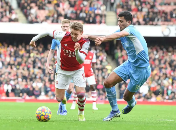Framed Print : Arsenal vs Manchester City: Martin Odegaard vs Rodri - Premier League Clash at Emirates Stadium Framed Print : Arsenal vs Manchester City: Martin Odegaard vs Rodri - Premier League Clash at Emirates Stadium