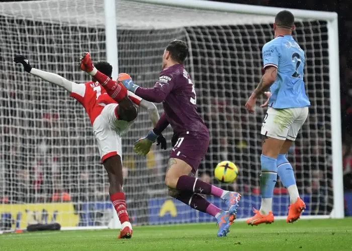 Framed Print : Arsenal vs Manchester City: Nketiah Fouls by Ederson in 2022-23 Premier League Clash Framed Print : Arsenal vs Manchester City: Nketiah Fouls by Ederson in 2022-23 Premier League Clash