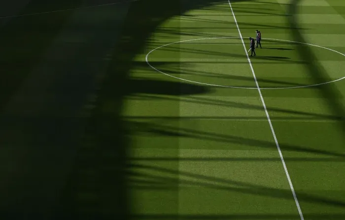 Framed Print : Arsenal vs Manchester City: Pre-Match Groundskeeping at Emirates Stadium