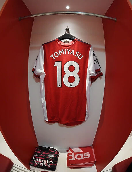 Arsenal vs Manchester City: Pre-Match Scene at Emirates Stadium - Tomiyasu's Jersey in the Changing Room (Premier League 2021-22)