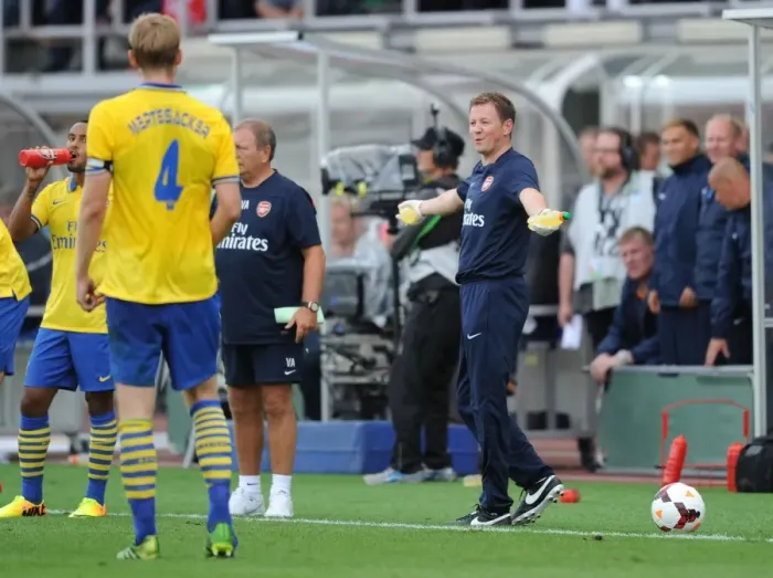 Framed Print : Arsenal vs Manchester City: Pre-Season Friendly - Arsenal Physio Colin Lewin at Olympic Stadium, Helsinki (2013)