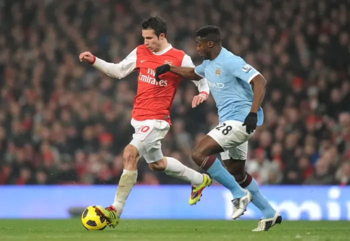 Framed Print : Arsenal vs Manchester City: Rival Rivals - Van Persie vs Toure Stalemate