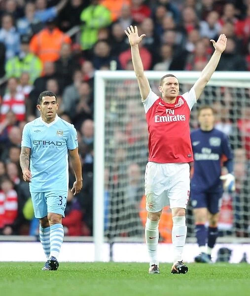 Arsenal vs Manchester City: Thomas Vermaelen and Carlos Tevez Clash in the 2011-12 Premier League