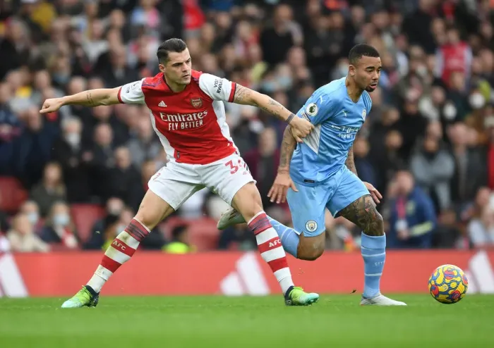 Framed Print : Arsenal vs Manchester City: Xhaka vs Jesus Clash in Premier League Showdown