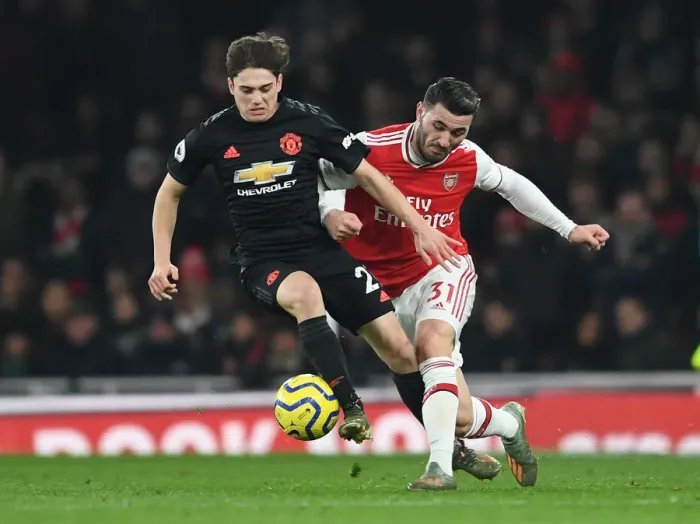 Framed Print : Arsenal vs Manchester United: Sead Kolasinac vs Daniel James - Premier League Clash at Emirates Stadium Framed Print : Arsenal vs Manchester United: Sead Kolasinac vs Daniel James - Premier League Clash at Emirates Stadium