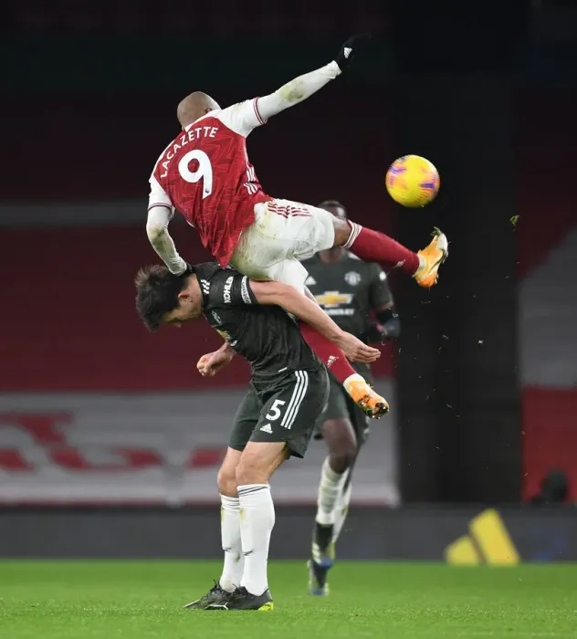 Framed Print : Arsenal vs Manchester United: Lacazette vs Maguire - Premier League Clash in Empty Emirates Stadium (January 2021) Framed Print : Arsenal vs Manchester United: Lacazette vs Maguire - Premier League Clash in Empty Emirates Stadium (January 2021)