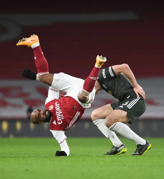 Framed Print : Arsenal vs Manchester United: Lacazette vs Maguire - Premier League Rivalry Under Coronavirus Restrictions (January 2021)