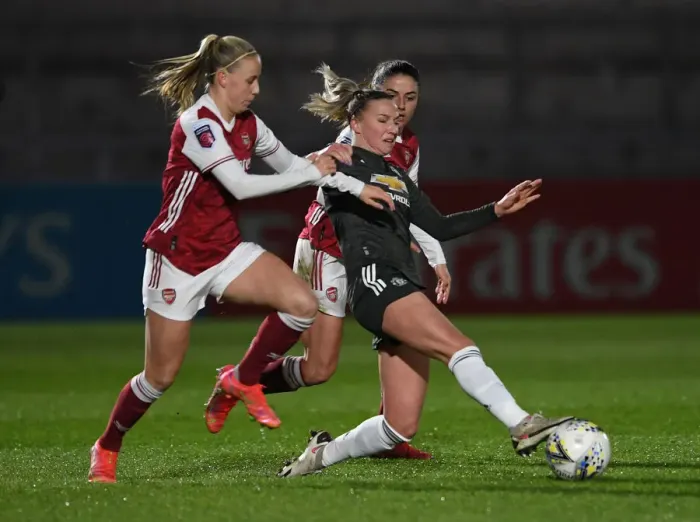 Framed Print : Arsenal vs Manchester United: Women's FA Super League Clash Amidst Empty Stands (Beth Mead vs Jackie Groenen) Framed Print : Arsenal vs Manchester United: Women's FA Super League Clash Amidst Empty Stands (Beth Mead vs Jackie Groenen)