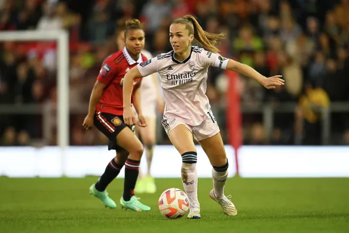 Framed Print : Arsenal vs Manchester United: FA Women's Super League Showdown at Leigh Sports Village - A Battle of Football Giants