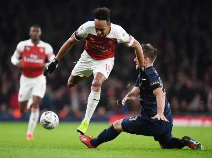 Framed Print : Arsenal vs Manchester United: Aubameyang vs Shaw Showdown - FA Cup Clash at Emirates Stadium