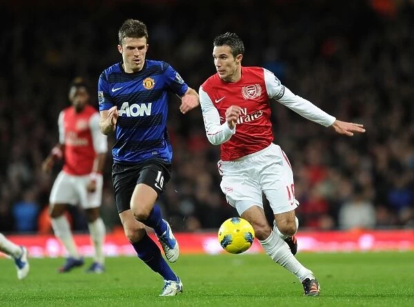 Arsenal vs Manchester United: A Battle Between Robin van Persie and Michael Carrick