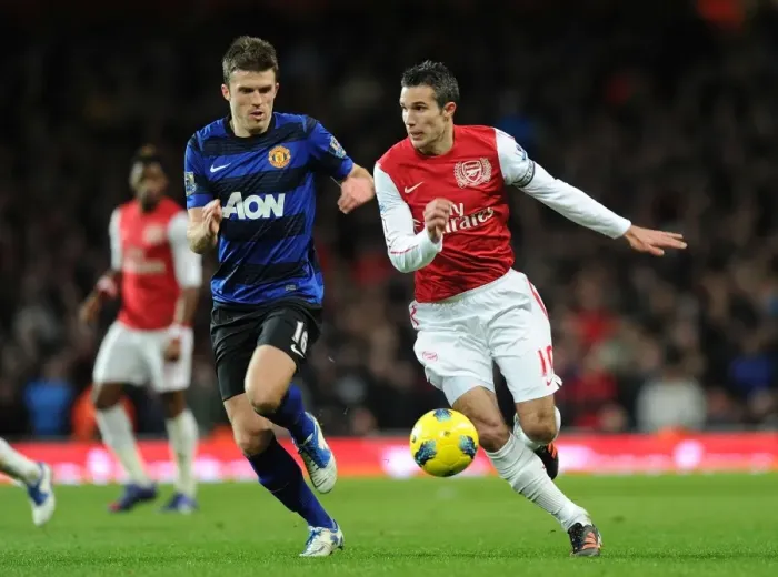 Framed Print : Arsenal vs Manchester United: A Battle Between Robin van Persie and Michael Carrick Framed Print : Arsenal vs Manchester United: A Battle Between Robin van Persie and Michael Carrick