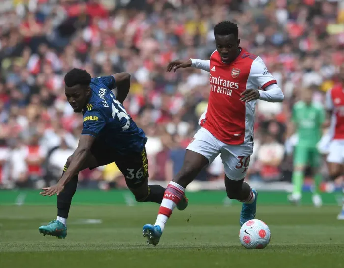 Framed Print : Arsenal vs Manchester United: Eddie Nketiah Clashes with Anthony Elanga in Intense Premier League Showdown Framed Print : Arsenal vs Manchester United: Eddie Nketiah Clashes with Anthony Elanga in Intense Premier League Showdown
