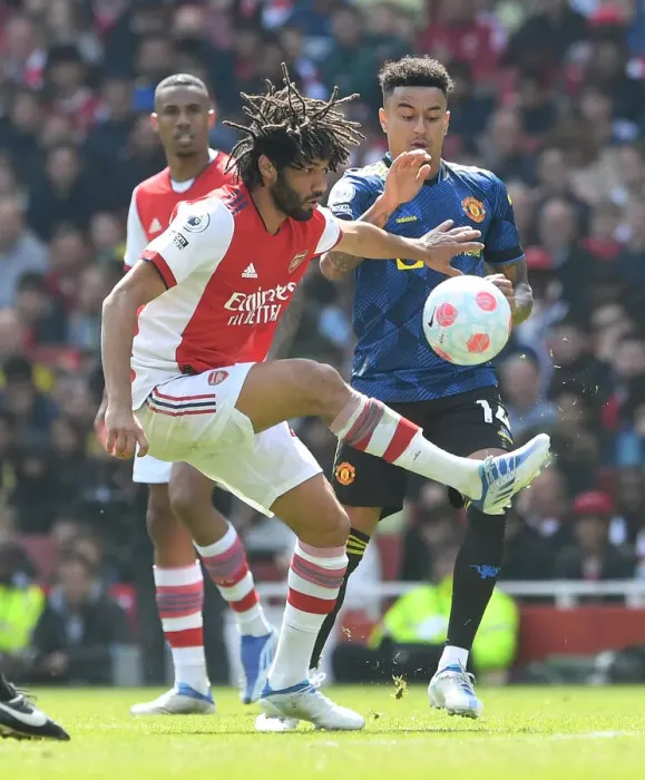 Framed Print : Arsenal vs Manchester United: Elneny Fends Off Lingard in Intense Premier League Clash Framed Print : Arsenal vs Manchester United: Elneny Fends Off Lingard in Intense Premier League Clash