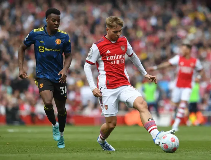 Framed Print : Arsenal vs Manchester United: Emile Smith Rowe vs Anthony Elanga - Intense Battle in the Premier League Framed Print : Arsenal vs Manchester United: Emile Smith Rowe vs Anthony Elanga - Intense Battle in the Premier League