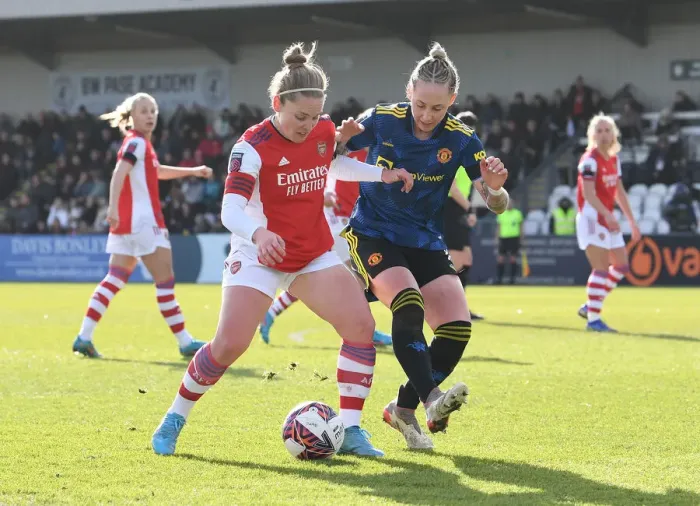 Framed Print : Arsenal vs Manchester United: A Fierce FA WSL Showdown - Battle of the Titans