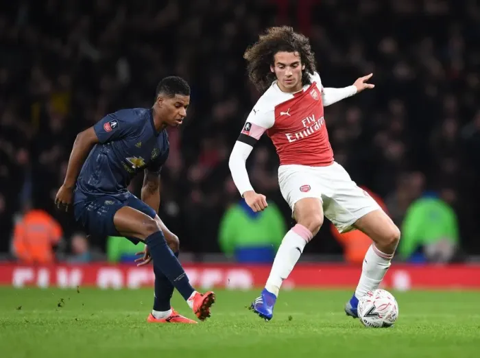 Framed Print : Arsenal vs Manchester United: Guendouzi vs Rashford Clash in FA Cup Fourth Round