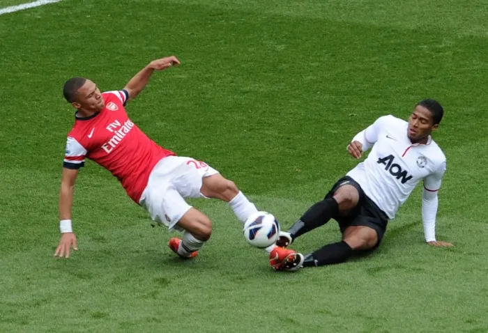 Framed Print : Arsenal vs Manchester United: Kieran Gibbs Fouls by Antonio Valencia (2013) Framed Print : Arsenal vs Manchester United: Kieran Gibbs Fouls by Antonio Valencia (2013)