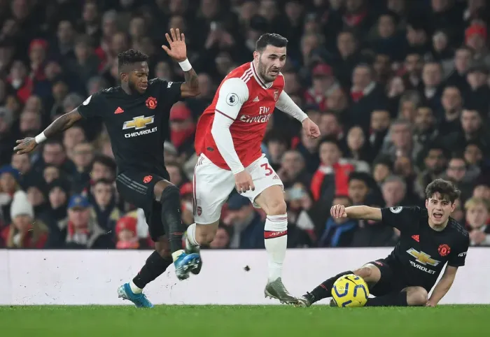 Framed Print : Arsenal vs Manchester United: Kolasinac Clashes with Fred and James in Intense Premier League Showdown (2019-20) Framed Print : Arsenal vs Manchester United: Kolasinac Clashes with Fred and James in Intense Premier League Showdown (2019-20)