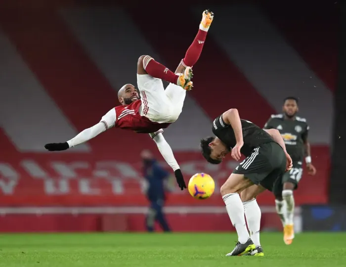Framed Print : Arsenal vs Manchester United: Lacazette Faces Maguire in Empty Emirates Stadium (2020-21) Framed Print : Arsenal vs Manchester United: Lacazette Faces Maguire in Empty Emirates Stadium (2020-21)