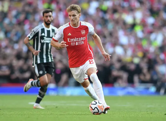 Framed Print : Arsenal vs Manchester United: Martin Odegaard Shines in the 2023-24 Premier League Clash at Emirates Stadium