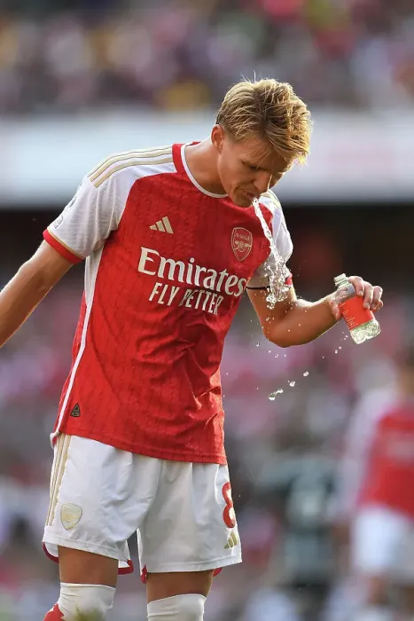 Framed Print : Arsenal vs Manchester United: Martin Ødegaard's Emotional Moment at Emirates Stadium (2023-24)