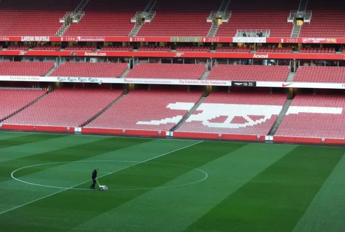 Framed Print : Arsenal vs Manchester United: Pre-Match Pitch Preparation at Emirates Stadium (2013-14)