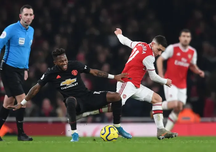 Framed Print : Arsenal vs Manchester United: Torreira vs Fred - Intense Battle in the Premier League (2019-20) Framed Print : Arsenal vs Manchester United: Torreira vs Fred - Intense Battle in the Premier League (2019-20)