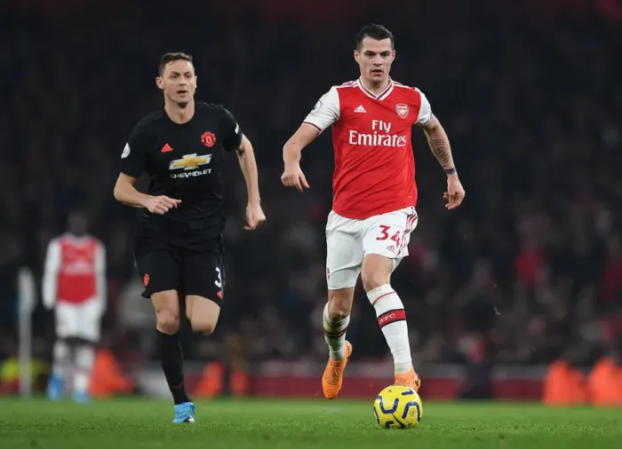 Framed Print : Arsenal vs Manchester United: Xhaka vs Matic Clash in Premier League Showdown