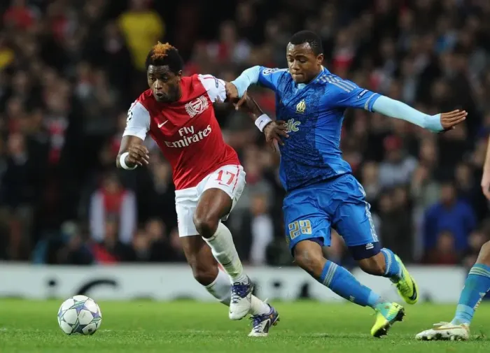 Framed Print : Arsenal vs Marseille: Battle between Song and Ayew in the 2011-12 Champions League Framed Print : Arsenal vs Marseille: Battle between Song and Ayew in the 2011-12 Champions League
