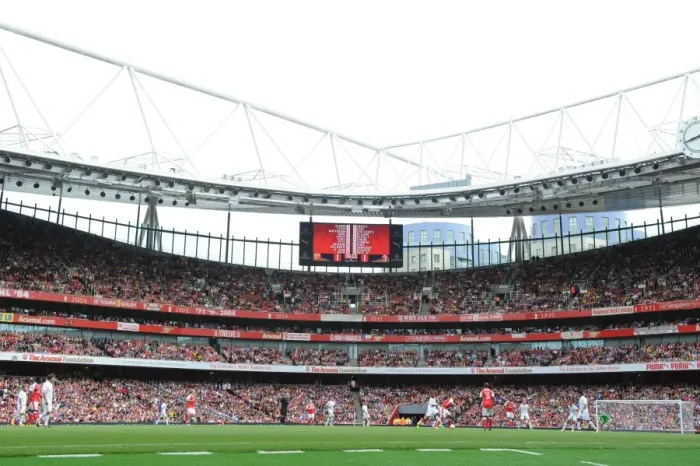 Framed Print : Arsenal vs Milan: A Clash of Football Legends at Emirates Stadium