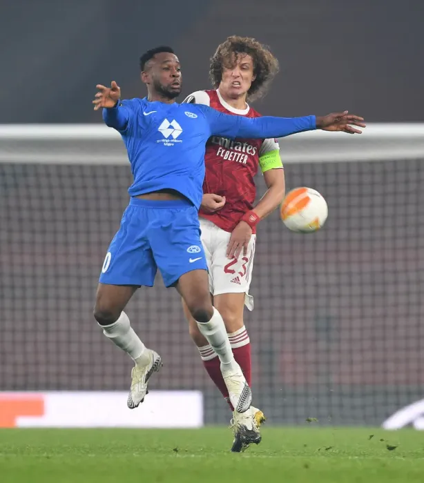 Framed Print : Arsenal vs Molde: David Luiz Clashes with Leke James in Europa League Showdown Framed Print : Arsenal vs Molde: David Luiz Clashes with Leke James in Europa League Showdown