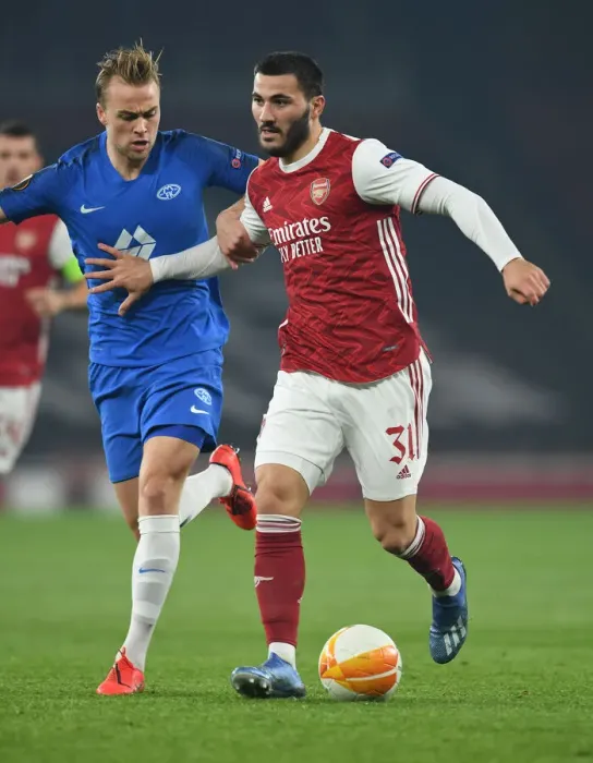 Framed Print : Arsenal vs Molde: Kolasinac Clashes with Ellingsen in UEFA Europa League Showdown