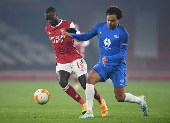 Framed Print : Arsenal vs Molde: Pepe Clashes with Wingo in Europa League Showdown