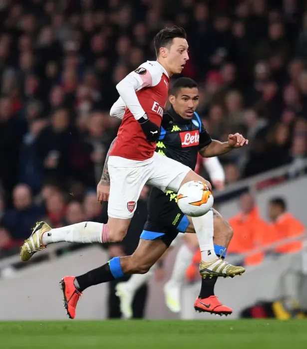 Framed Print : Arsenal vs. Napoli: Mesut Ozil Clashes with Allan in Europa League Quarterfinal