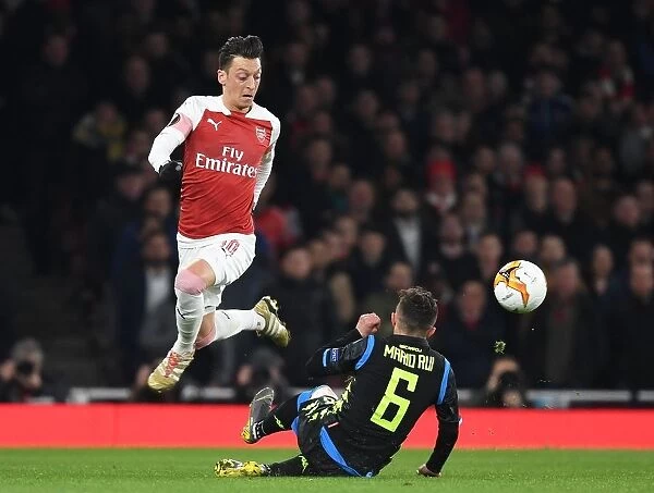 Arsenal vs. Napoli: Mesut Ozil Clashes with Mario Rui in Europa League Quarterfinal
